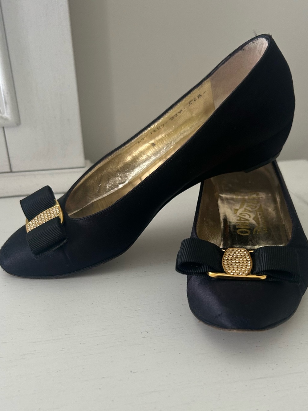 Salvatore Ferragamo Black Satin Bow Pumps with Gold Accent Diamond like Stones